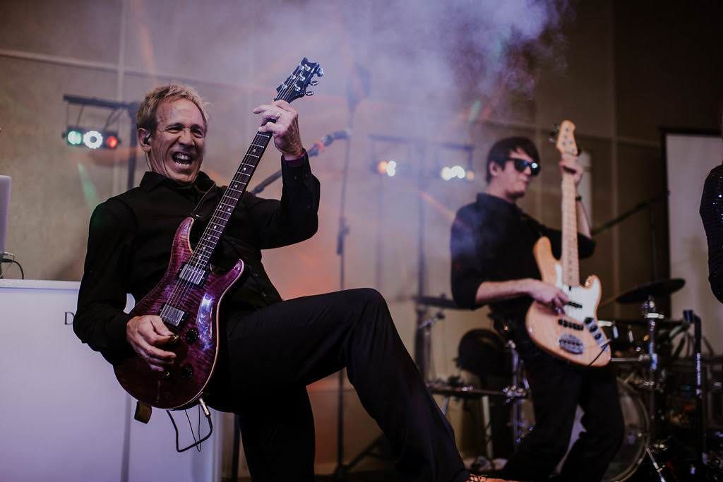 guitarist-bassist-performing